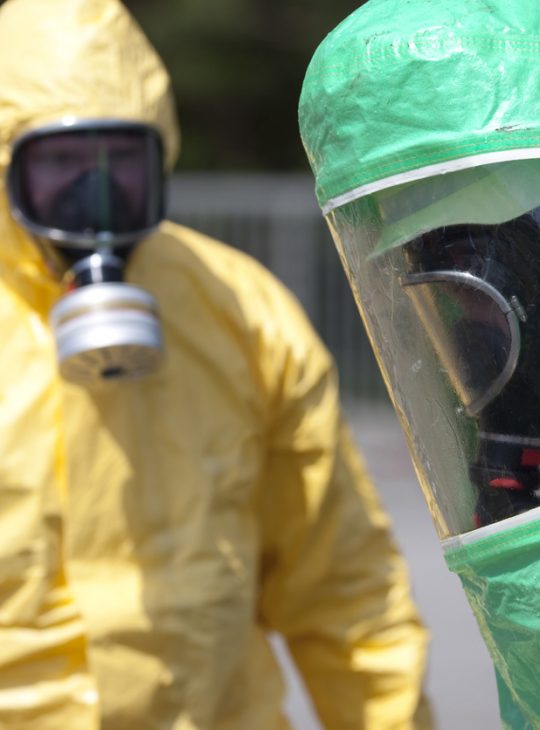 Two men in protective gear